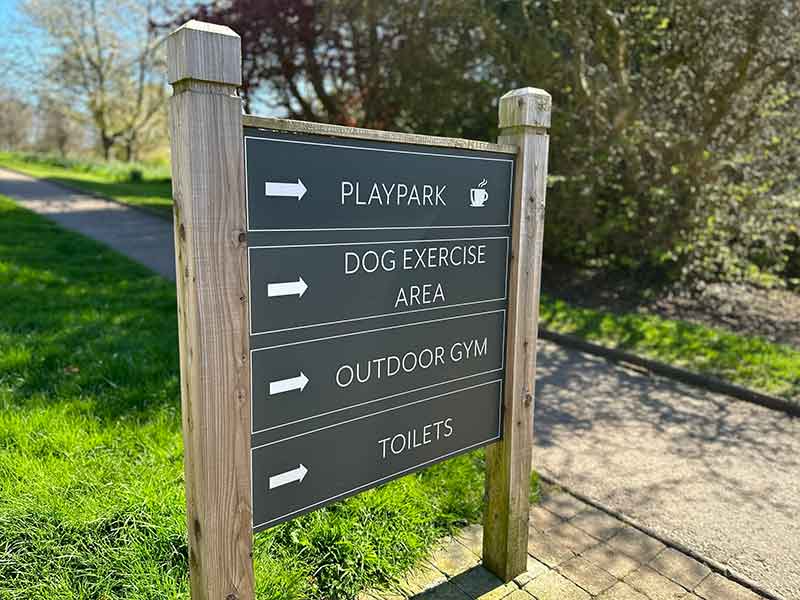 wooden modern sign for stormont trails