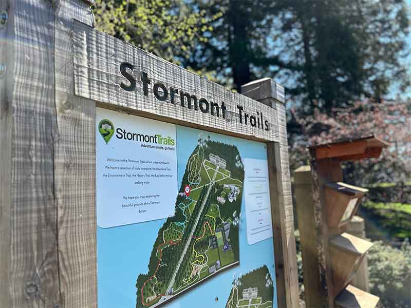 wooden sign for stormont trails